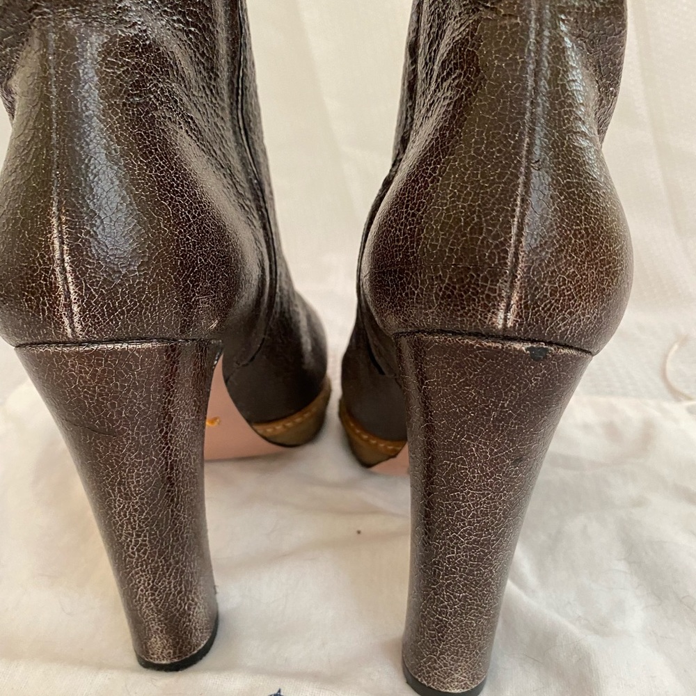 Prada distressed heeled booties